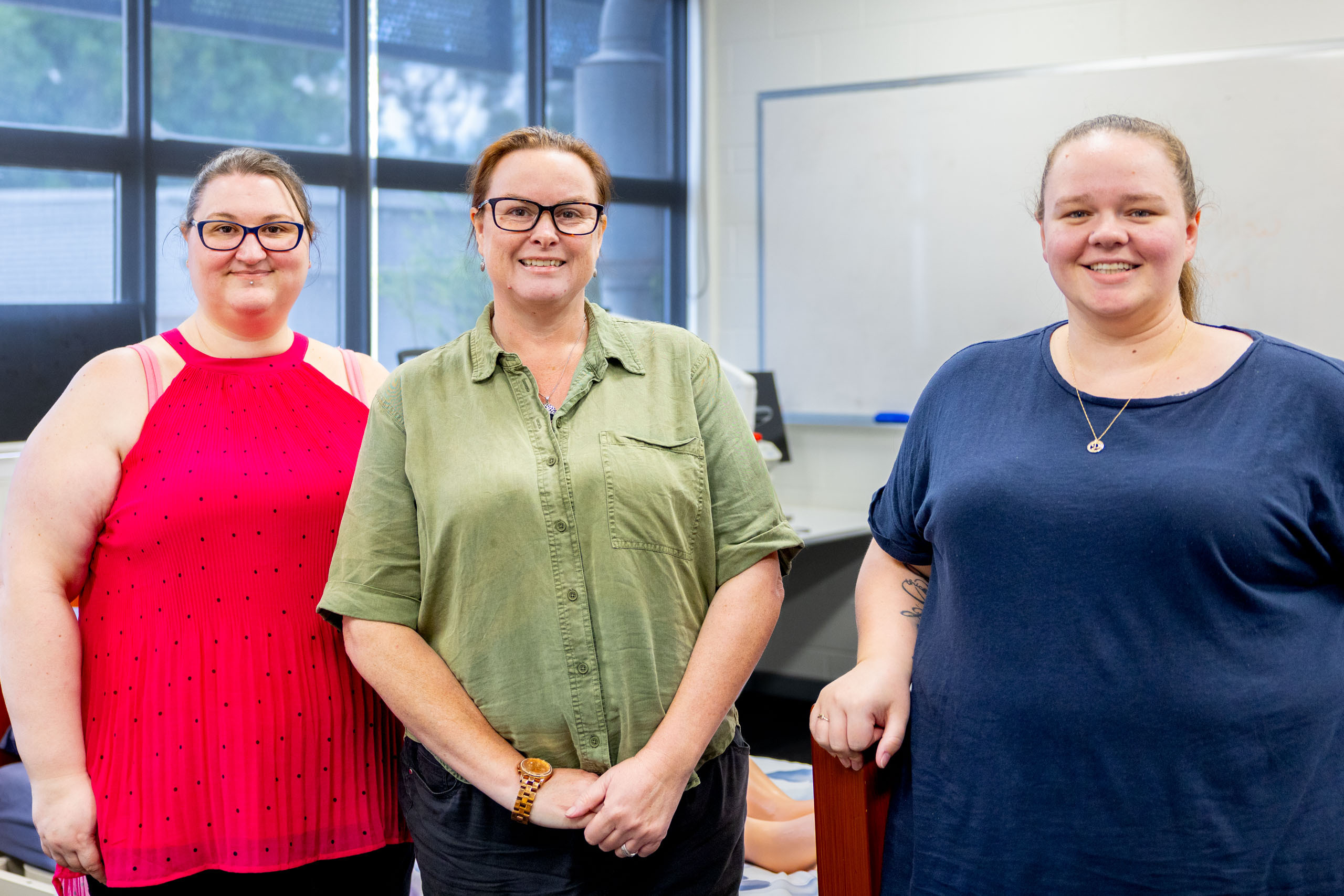 Student Tammy Welch, teacher Julia Barwick and student Jessica Wilson-McElwaine.