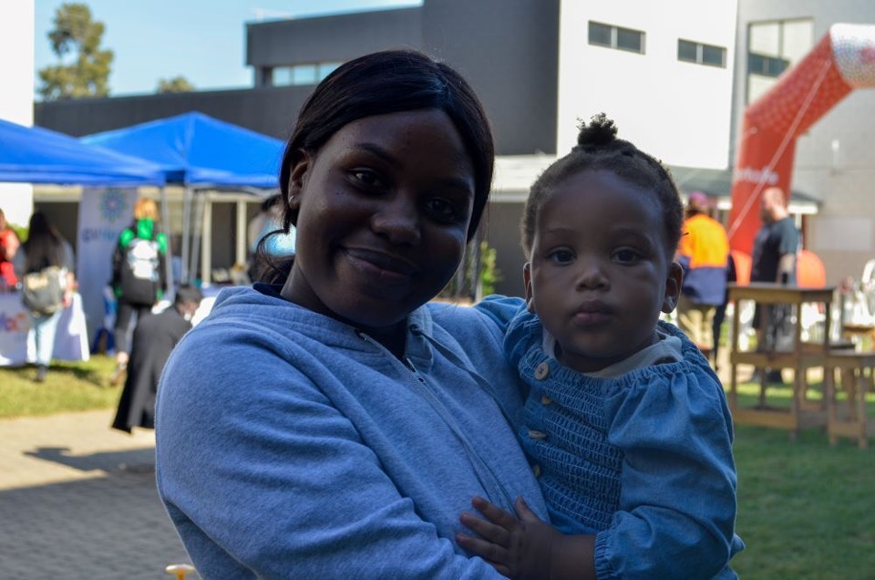 Social Justice Charter Attendee and their child