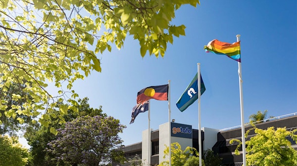 Flags outside Fryers Street Campus
