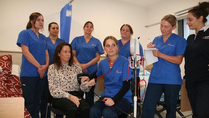 Hon Jaclyn Symes MP having heart rate monitored by student nurses.