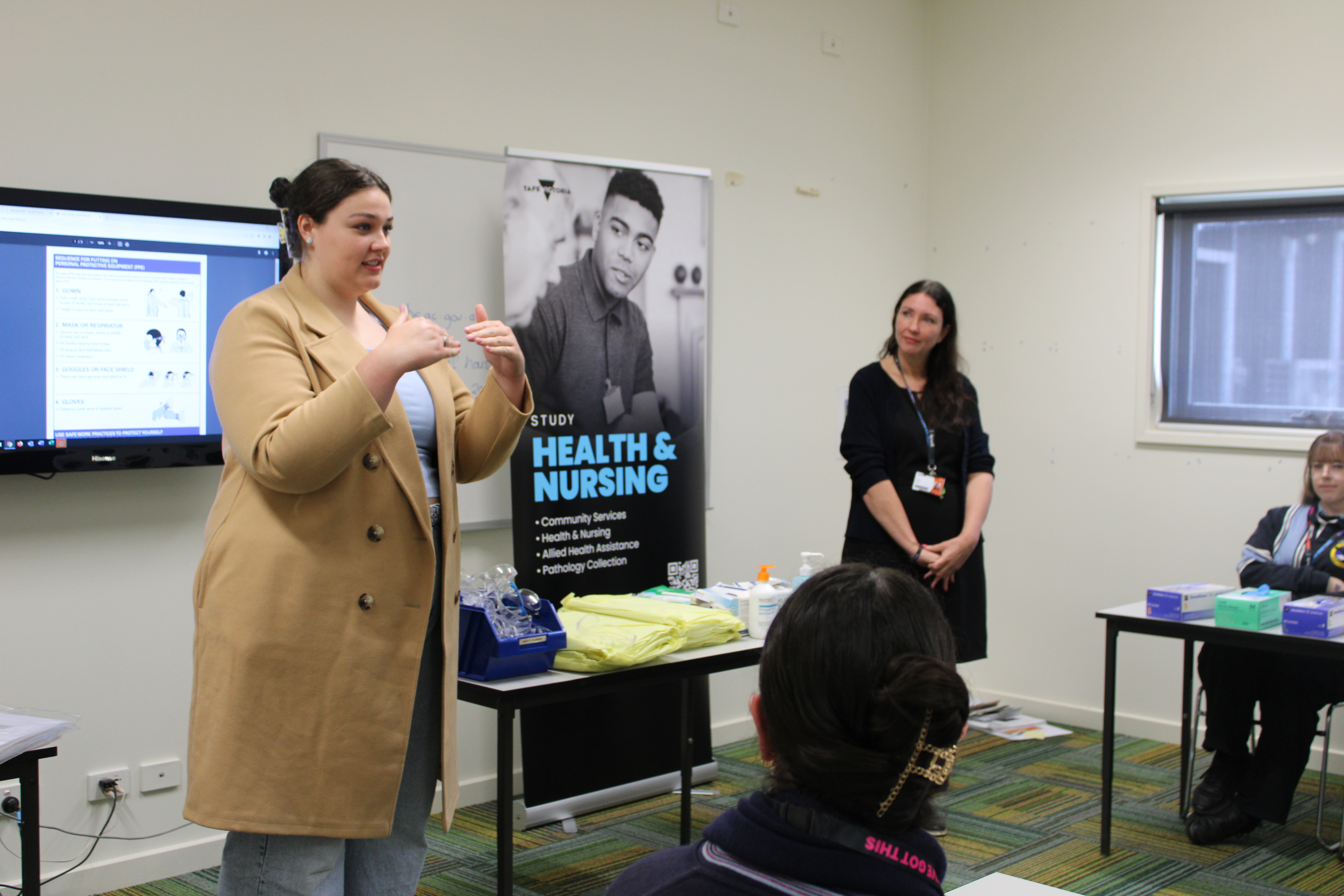Angelina Butler speaking at NE Health Careers Expo.