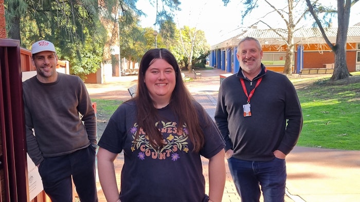 Ruby Sait with Senior Secondary Teacher Mitch Seaton and Youth Engagement Officer Kel Vincent.