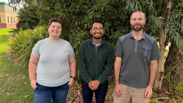 Seymour IT student Georgia de Totto, trainer Sai Kommineni and student Samuel Dean.