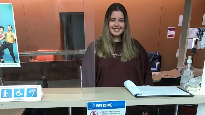 Paris Paul at reception desk